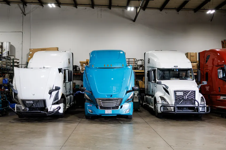 Commercial trucks parked at the Truck Clinic shop on Anderson Drive in Romeoville